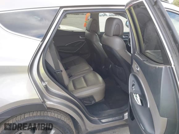 ✅ 2017 Hyundai Santa Fe Ultimate • VIN: 5XYZW4LA7HG399397 • Lot: 43350982. Wystawiony na IAAI z przebiegiem 138 307 mil. Bezpłatny archiwum sprzedaży aukcyjnych z USA i szczegółowy raport historii pojazdu na DreamBid. Zdjęcie 8.