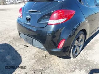 ✅ 2012 Hyundai Veloster w/Black Int • VIN: KMHTC6AD8CU046029 • Lot: 41664151. Wystawiony na IAAI z przebiegiem 163 523 mil. Bezpłatny archiwum sprzedaży aukcyjnych z USA i szczegółowy raport historii pojazdu na DreamBid. Zdjęcie 6.
