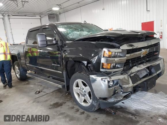 ✅ 2015 Chevrolet Silverado 2500HD LTZ • VIN: 1GC1KWE82FF136071 • Lot: 42097783. Listed on IAAI with 160,887 mi. Free auction sales archive from the USA and detailed vehicle history report at DreamBid. Image 1.
