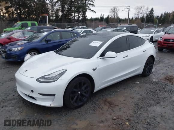 ✅ 2020 Tesla Model 3 Standard Range Plus • VIN: 5YJ3E1EA7LF799447 • Лот: 43752660. Опубликован ранее на IAAI с пробегом 63 864 миль. Бесплатный доступ к архиву аукционных продаж из США и подробный отчёт об истории автомобиля на DreamBid. Изображение 2.