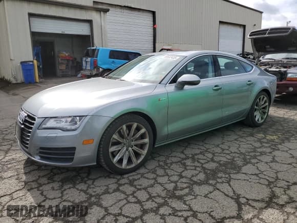 ✅ 2012 Audi A7 Premium Plus • VIN: WAUSGAFC5CN001354 • Lot: 50632435. Listed on Copart with 111,049 mi. Free auction sales archive from the USA and detailed vehicle history report at DreamBid. Image 1.