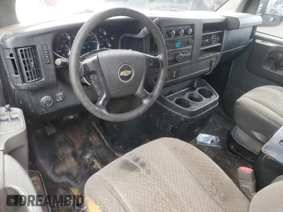 ✅ 2014 Chevrolet Express Cargo • VIN: 1GCWGFCG2E1183226 • Lot: 67111245. Listed on Copart with 181,401 mi. Free auction sales archive from the USA and detailed vehicle history report at DreamBid. Image 8.