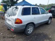 ✅ 2004 Hyundai Santa Fe GLS • VIN: KM8SC73D24U599503 • Lot: 43200700. Listed on IAAI with 179,315 mi. Free auction sales archive from the USA and detailed vehicle history report at DreamBid. Image 4.