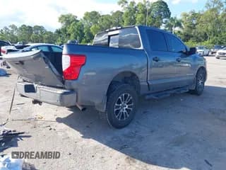 ✅ 2023 Nissan Titan SV • VIN: 1N6AA1EF8PN115279 • Lot: 43521027. Wystawiony na IAAI z przebiegiem 59 489 mil. Bezpłatny archiwum sprzedaży aukcyjnych z USA i szczegółowy raport historii pojazdu na DreamBid. Zdjęcie 4.