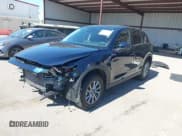 ✅ 2023 Mazda CX-5 S Carbon Edition • VIN: JM3KFBCMXP0282649 • Lot: 42784337. Listed on IAAI with 25,589 mi. Free auction sales archive from the USA and detailed vehicle history report at DreamBid. Image 18.