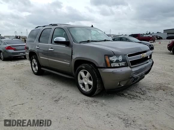 ✅ 2012 Chevrolet Tahoe LTZ • VIN: 1GNSCCE02CR259655 • Lot: 55184505. Listed on Copart with 199,189 mi. Free auction sales archive from the USA and detailed vehicle history report at DreamBid. Image 14.