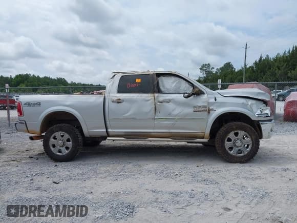 ✅ 2018 Ram 2500 Laramie • VIN: 3C6UR5FLXJG420990 • Lot: 42069972. Listed on IAAI with Not provided. Free auction sales archive from the USA and detailed vehicle history report at DreamBid. Image 12.
