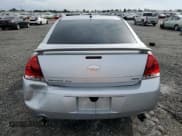 ✅ 2014 Chevrolet Impala LTZ • VIN: 2G1WC5E38E1147222 • Lot: 82001215. Listed on Copart with 160,275 mi. Free auction sales archive from the USA and detailed vehicle history report at DreamBid. Image 6.