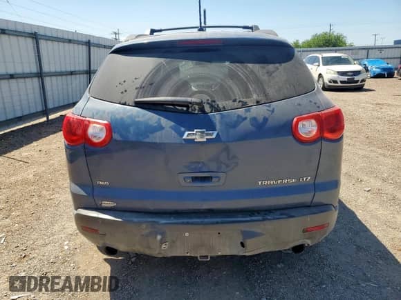 2012 Chevrolet Traverse LTZ z VIN 1GNKVLED4CJ315722, wystawiony jako Copart lot #70196955 z przebiegiem 161 806 mil mil oraz Szkoda całkowita • Salvage title. Historia ofert i sprzedaży dostępna na DreamBid. Obrazek 6.