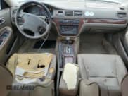 ✅ 1998 Acura TL • VIN: JH4UA3645WC003055 • Лот: 79900284. Опубликован ранее на Copart с пробегом 119 525 миль. Бесплатный доступ к архиву аукционных продаж из США и подробный отчёт об истории автомобиля на DreamBid. Изображение 8.