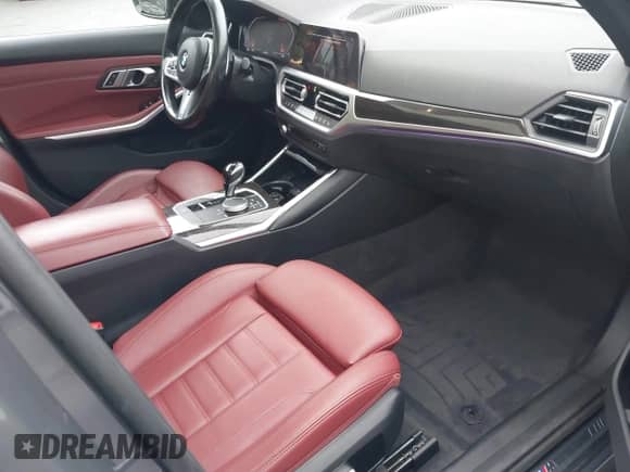 2022 BMW 3 Series 330i xDrive with VIN WBA5R7C05NFM16689, listed as a IAAI auction lot 42530938 with 56,777 mi miles and . Bid and sale history available at DreamBid. Image 5.