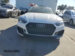 ✅ 2019 Audi RS 5 Sportback • VIN: WUABWCF59KA902013 • Лот: 82654575. Опубликован ранее на Copart с пробегом 100 634 миль. Бесплатный доступ к архиву аукционных продаж из США и подробный отчёт об истории автомобиля на DreamBid. Изображение 5.
