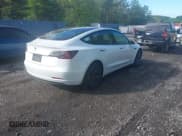 ✅ 2023 Tesla Model 3 • VIN: 5YJ3E1EA9PF576610 • Lot: 42206777. Listed on IAAI with 21,658 mi. Free auction sales archive from the USA and detailed vehicle history report at DreamBid. Image 4.