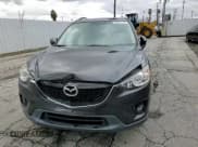 ✅ 2015 Mazda CX-5 Touring • VIN: JM3KE2CY5F0452632 • Lot: 92671715. Wystawiony na Copart z przebiegiem Nie podano. Bezpłatny archiwum sprzedaży aukcyjnych z USA i szczegółowy raport historii pojazdu na DreamBid. Zdjęcie 14.