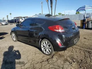 ✅ 2013 Hyundai Veloster w/Black Int • VIN: KMHTC6AD2DU172856 • Lot: 48562135. Wystawiony na Copart z przebiegiem 74 085 mil. Bezpłatny archiwum sprzedaży aukcyjnych z USA i szczegółowy raport historii pojazdu na DreamBid. Zdjęcie 2.