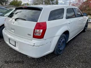 ✅ 2006 Dodge Magnum R/T • VIN: 2D4GZ57226H398988 • Lot: 96195305. Listed on Copart with Not provided. Free auction sales archive from the USA and detailed vehicle history report at DreamBid. Image 4.