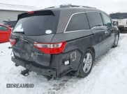 ✅ 2012 Honda Odyssey Touring • VIN: 5FNRL5H95CB049148 • Lot: 43831103. Listed on IAAI with 288,928 mi. Free auction sales archive from the USA and detailed vehicle history report at DreamBid. Image 4.