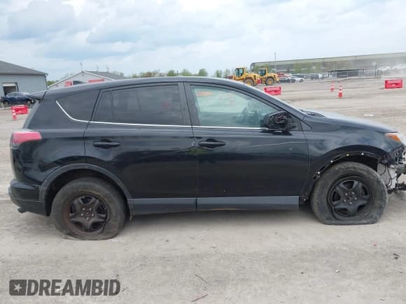 ✅ 2018 Toyota RAV4 LE • VIN: 2T3BFREVXJW763690 • Lot: 42171331. Listed on IAAI with 133,428 mi. Free auction sales archive from the USA and detailed vehicle history report at DreamBid. Image 13.