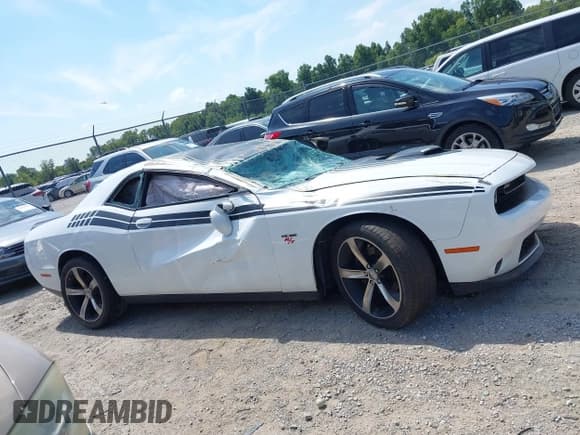 ✅ 2016 Dodge Challenger R/T Plus • VIN: 2C3CDZBT2GH230792 • Lot: 42979793. Listed on IAAI with 104,900 mi. Free auction sales archive from the USA and detailed vehicle history report at DreamBid. Image 13.
