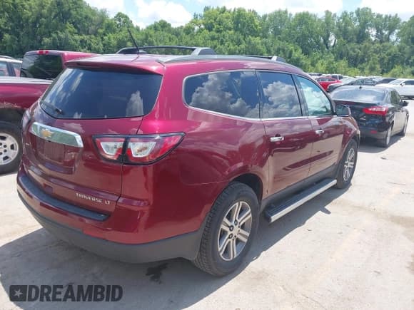 ✅ 2015 Chevrolet Traverse LT • VIN: 1GNKVHKD8FJ380773 • Lot: 42647584. Listed on IAAI with 106,932 mi. Free auction sales archive from the USA and detailed vehicle history report at DreamBid. Image 4.