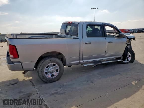 ✅ 2014 Ram 2500 SLT • VIN: 3C6TR5DT2EG205852 • Lot: 59514745. Listed on Copart with 130,510 mi. Free auction sales archive from the USA and detailed vehicle history report at DreamBid. Image 3.