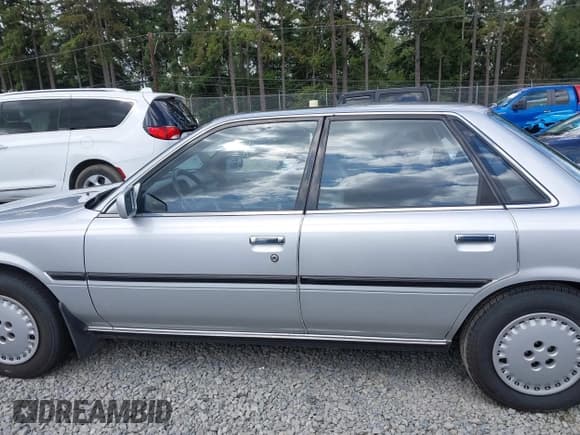 ✅ 1988 Toyota Camry LE • VIN: JT2SV22E9J3261621 • Lot: 42543098. Wystawiony na IAAI z przebiegiem 154 582 mil. Bezpłatny archiwum sprzedaży aukcyjnych z USA i szczegółowy raport historii pojazdu na DreamBid. Zdjęcie 14.