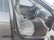 ✅ 2015 Cadillac SRX Performance Collection • VIN: 3GYFNCE34FS634617 • Lot: 43568133. Listed on IAAI with 106,675 mi. Free auction sales archive from the USA and detailed vehicle history report at DreamBid. Image 5.