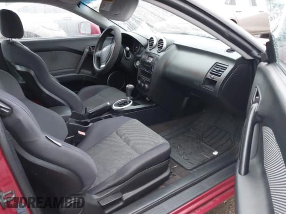 ✅ 2006 Hyundai Tiburon GS • VIN: KMHHM65D06U194001 • Лот: 43849075. Опубликован ранее на IAAI с пробегом 246 283 миль. Бесплатный доступ к архиву аукционных продаж из США и подробный отчёт об истории автомобиля на DreamBid. Изображение 5.