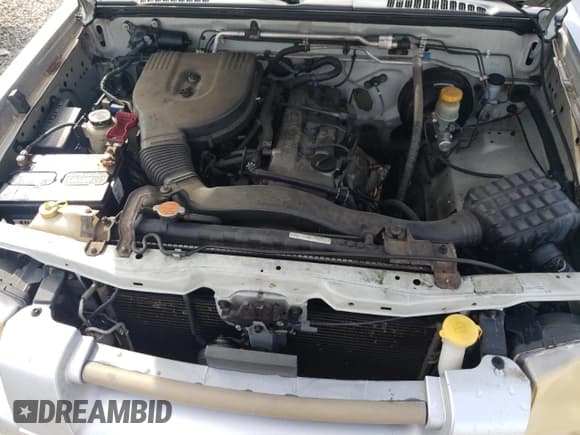 ✅ 2001 Nissan Frontier XE • VIN: 1N6DD26S81C355165 • Лот: 71413255. Опубликован ранее на Copart с пробегом 232 120 миль. Бесплатный доступ к архиву аукционных продаж из США и подробный отчёт об истории автомобиля на DreamBid. Изображение 11.