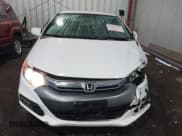 ✅ 2012 Honda Insight EX • VIN: JHMZE2H71CS003132 • Lot: 42582548. Listed on IAAI with 112,593 mi. Free auction sales archive from the USA and detailed vehicle history report at DreamBid. Image 12.