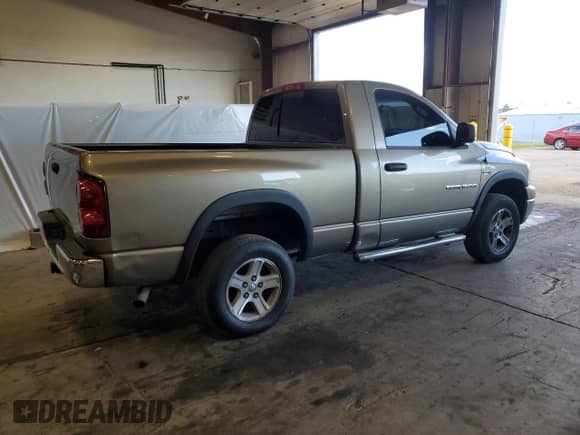 2007 Dodge 1500 SLT with VIN 1D7HU16287J538350, listed as a Copart auction lot 70374565 with 176,813 mi miles and Salvage title. Bid and sale history available at DreamBid. Image 3.