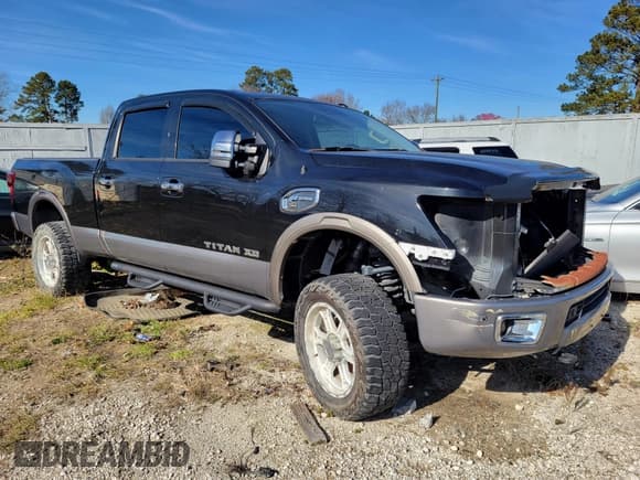 ✅ 2016 Nissan Titan SL • VIN: 1N6BA1F20GN513778 • Lot: 41373178. Listed on IAAI with 85,829 mi. Free auction sales archive from the USA and detailed vehicle history report at DreamBid. Image 1.
