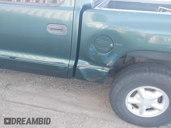 ✅ 2000 Dodge Dakota Sport • VIN: 1B7HG2AZ4YS724393 • Lot: 43645937. Wystawiony na IAAI z przebiegiem 144 705 mil. Bezpłatny archiwum sprzedaży aukcyjnych z USA i szczegółowy raport historii pojazdu na DreamBid. Zdjęcie 6.