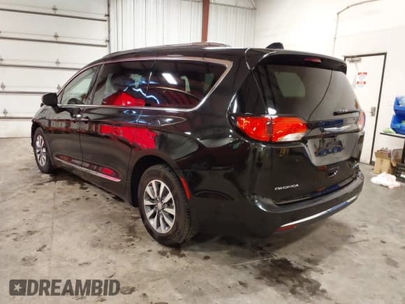 ✅ 2020 Chrysler Pacifica Hybrid Limited • VIN: 2C4RC1N75LR105539 • Лот: 42693774. Опубликован ранее на IAAI с пробегом 97 310 миль. Бесплатный доступ к архиву аукционных продаж из США и подробный отчёт об истории автомобиля на DreamBid. Изображение 3.