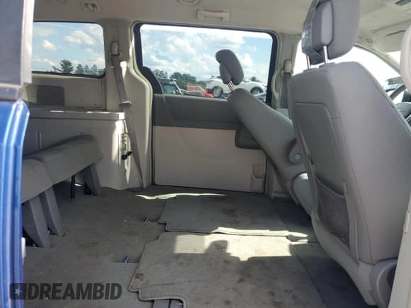 ✅ 2010 Dodge Grand Caravan SXT • VIN: 2D4RN5D19AR489601 • Лот: 70629315. Опубликован ранее на Copart с пробегом 242 179 миль. Бесплатный доступ к архиву аукционных продаж из США и подробный отчёт об истории автомобиля на DreamBid. Изображение 11.