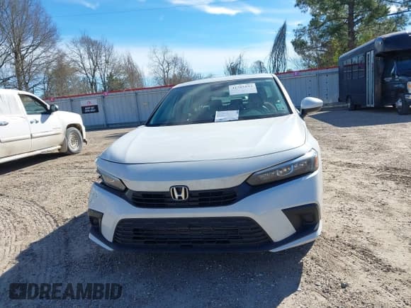 ✅ 2022 Honda Civic EX • VIN: JHMFE1F7XNX002986 • Lot: 41705193. Listed on IAAI with 61,718 mi. Free auction sales archive from the USA and detailed vehicle history report at DreamBid. Image 12.