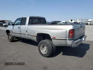 1999 Dodge 3500 with VIN 1B7MF3360XJ604685, listed as a Copart auction lot 65044415 with 319,634 mi miles and Salvage title. Bid and sale history available at DreamBid. Image 2.