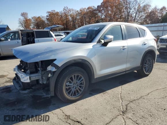 ✅ 2021 Mazda CX-5 Touring • VIN: JM3KFBCM0M0450973 • Lot: 92608715. Wystawiony na Copart z przebiegiem 91 044 mil. Bezpłatny archiwum sprzedaży aukcyjnych z USA i szczegółowy raport historii pojazdu na DreamBid. Zdjęcie 1.