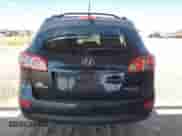 2011 Hyundai Santa Fe GLS z VIN 5XYZGDAG7BG019681, wystawiony jako Copart lot #67726714 z przebiegiem 175 070 mil mil oraz Szkoda całkowita • Salvage title. Historia ofert i sprzedaży dostępna na DreamBid. Obrazek 6.