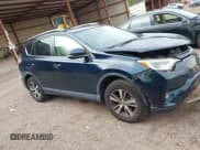 ✅ 2018 Toyota RAV4 XLE • VIN: JTMWFREV9JJ747531 • Lot: 43395687. Listed on IAAI with 164,882 mi. Free auction sales archive from the USA and detailed vehicle history report at DreamBid. Image 13.