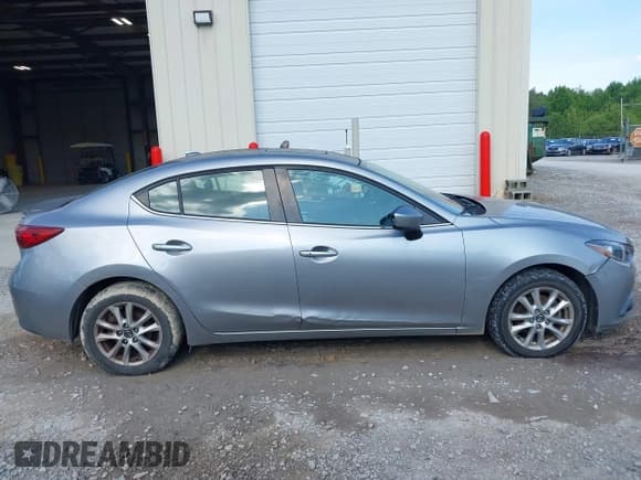 ✅ 2015 Mazda 3 i Touring • VIN: 3MZBM1V74FM144856 • Lot: 42570180. Listed on IAAI with 132,573 mi. Free auction sales archive from the USA and detailed vehicle history report at DreamBid. Image 13.