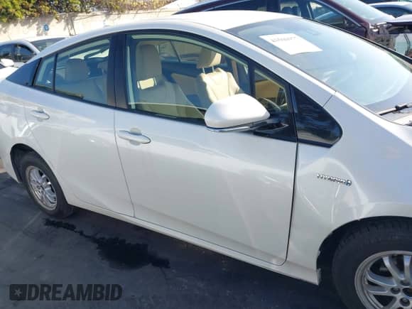 2020 Toyota Prius LE with VIN JTDL9RFU7L3015647, listed as a IAAI auction lot 43500977 with 55,174 mi miles and . Bid and sale history available at DreamBid. Image 14.