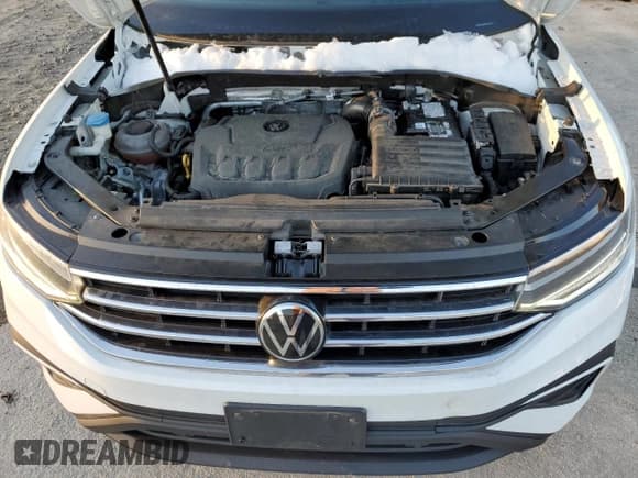 ✅ 2022 Volkswagen Tiguan SE • VIN: 3VV2B7AX2NM122341 • Lot: 86706564. Wystawiony na Copart z przebiegiem 27 709 mil. Bezpłatny archiwum sprzedaży aukcyjnych z USA i szczegółowy raport historii pojazdu na DreamBid. Zdjęcie 12.