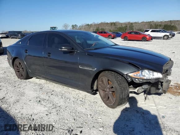 ✅ 2012 Jaguar XJ • VIN: SAJWA1CB1CLV31450 • Лот: 46883875. Опубликован ранее на Copart с пробегом 150 268 миль. Бесплатный доступ к архиву аукционных продаж из США и подробный отчёт об истории автомобиля на DreamBid. Изображение 4.