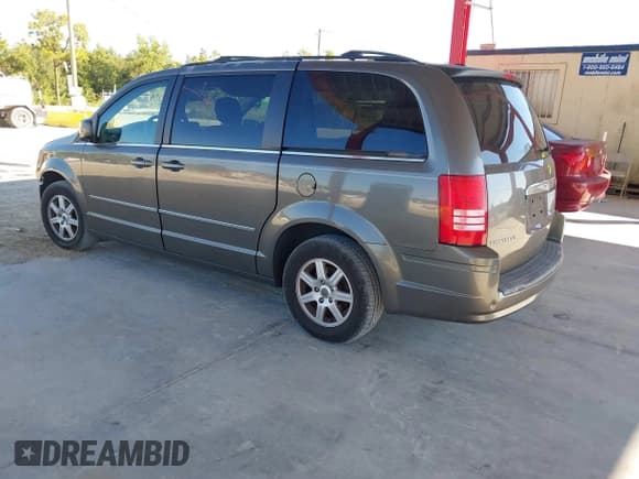 ✅ 2010 Chrysler Town & Country Touring • VIN: 2A4RR5D12AR226507 • Lot: 43780060. Listed on IAAI with 143,329 mi. Free auction sales archive from the USA and detailed vehicle history report at DreamBid. Image 3.