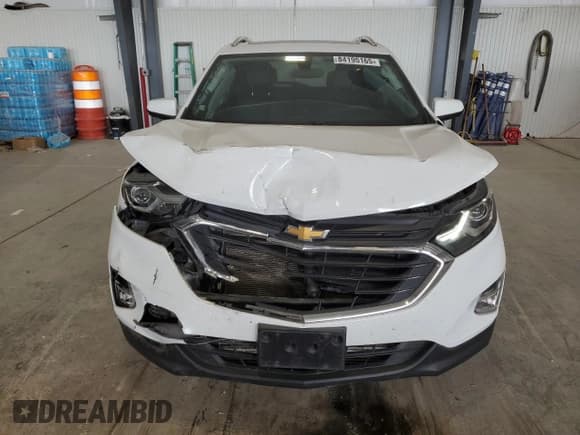 ✅ 2019 Chevrolet Equinox LT • VIN: 2GNAXUEV8K6100358 • Lot: 84195165. Wystawiony na Copart z przebiegiem 105 454 mil. Bezpłatny archiwum sprzedaży aukcyjnych z USA i szczegółowy raport historii pojazdu na DreamBid. Zdjęcie 5.