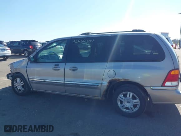 ✅ 2003 Ford Windstar SE • VIN: 2FMZA524X3BA56544 • Lot: 42636341. Wystawiony na IAAI z przebiegiem 189 299 mil. Bezpłatny archiwum sprzedaży aukcyjnych z USA i szczegółowy raport historii pojazdu na DreamBid. Zdjęcie 14.