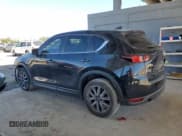 ✅ 2018 Mazda CX-5 Touring • VIN: JM3KFBCM6J0306985 • Lot: 91616465. Wystawiony na Copart z przebiegiem 106 570 mil. Bezpłatny archiwum sprzedaży aukcyjnych z USA i szczegółowy raport historii pojazdu na DreamBid. Zdjęcie 2.