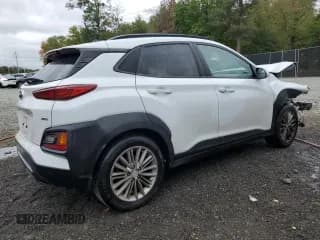 ✅ 2020 Hyundai Kona SEL • VIN: KM8K2CAA5LU593276 • Лот: 86307065. Опубликован ранее на Copart с пробегом 97 737 миль. Бесплатный доступ к архиву аукционных продаж из США и подробный отчёт об истории автомобиля на DreamBid. Изображение 3.