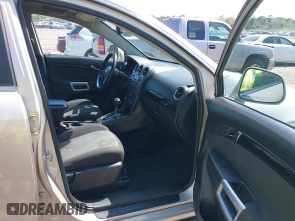 ✅ 2013 Chevrolet Captiva Sport LT • VIN: 3GNAL3EK4DS557197 • Lot: 42011329. Wystawiony na IAAI z przebiegiem 164 539 mil. Bezpłatny archiwum sprzedaży aukcyjnych z USA i szczegółowy raport historii pojazdu na DreamBid. Zdjęcie 5.